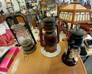 vintage lanterns and a modern one 