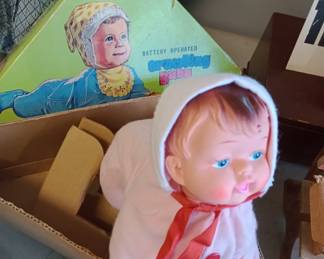 Vintage battery operated crawling baby. in original box
