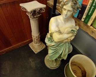 statues and plant stands large 