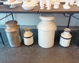 vintage cream cans and milk jugs stainless one is military 