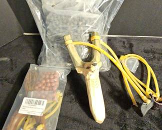 Two Sling Shots with Pellets