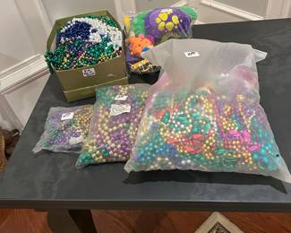 Several bundles of Mardi Gras beads