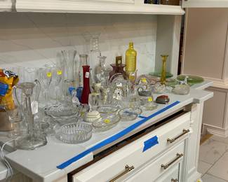 Multiple pieces of depression, glass, crystal, clocks, and other glass  items 