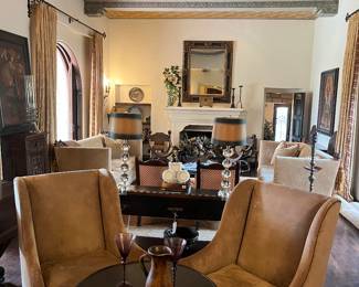 Two oversized, suede and wood sitting chairs
L32” x D 38” x H 46”