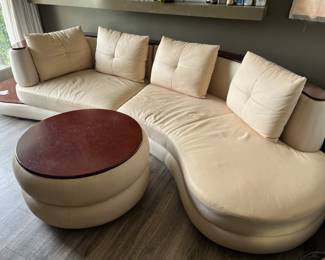 Leather and wood Italian modern sectional
Full length 140” 
Coffee table 32 inches Height 19 inches