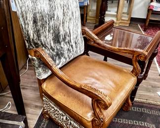 Animal hide back armed side chair