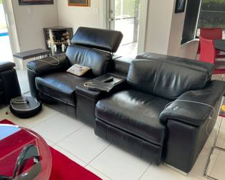 Pair of black leather recliners and matching sofa purchased 2 years ago.