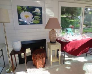 Living room area, end tables, floor and table lamps, rattan storage basket.