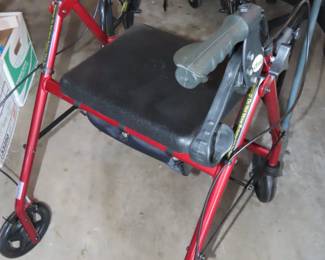 Walker with seat and brakes.
