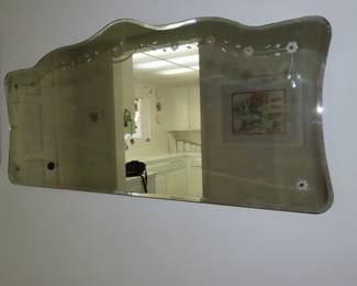 Venitian etched glass mirror.