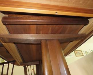 Made in Denmark, "Gudme Mobelfabrik", teak dining table with two leaves stored underneath.