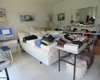 Master bedroom, two adjustable twin beds, sheets, pillows, comforters, blankets and foam topper. storage bins, shoes, purses, gloves.