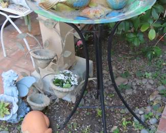 Bird bath and yard decor.
