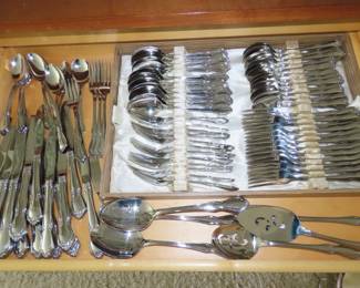 Large set of Oneida stainless flatware.