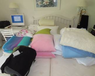 Pillows, blankets, bed linens twin and full size.