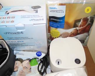 Phillips Respironics CPAP machine, Proactiv nebulizer and new unopened tubes, masks and supplies.