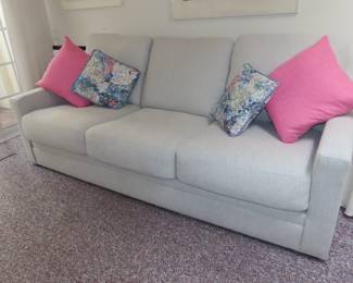 Grey fabric sofa (like new).
