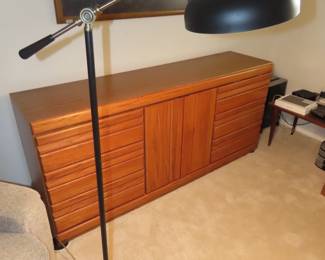 Oak drawers and vintage floor lamp.