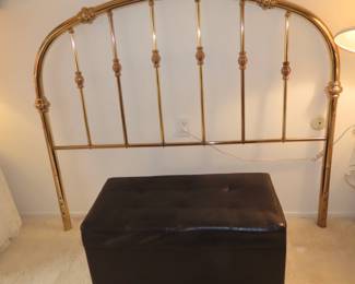Full size brass head rail. Leather like storage ottaman.