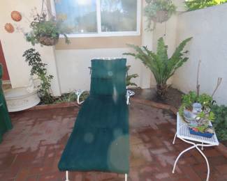 Sun lounger and end table.