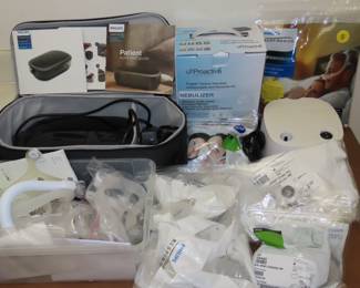 Phillips Respironics CPAP machine, Proactiv nebulizer and new unopened tubes, masks and supplies.