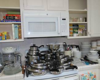 Cookware, everyday day white dinner set, Pyrex, cook books, storage cannisters.