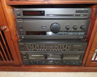 Three Technics stereo components.