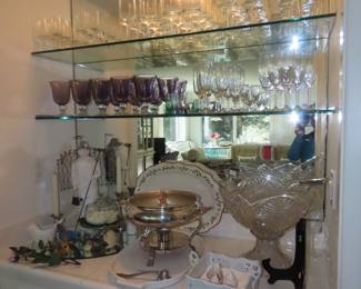 Amethyst water goblets, champagne flutes, wine stems. Punch bowl/cups/ladle, silverplate heated covered casserole.