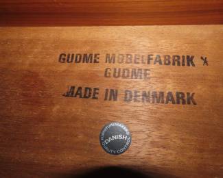 Made in Denmark, "Gudme Mobelfabrik", teak dining table with two leaves stored underneath.
