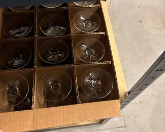 Lots of drinking glasses and stemware