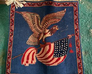 Pictorial Kashan rug depicting a flying eagle clutching a 48 star flag, 1950s