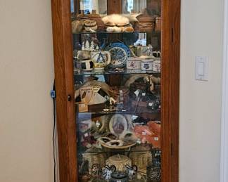 1 of 2 curio cabinets with lights