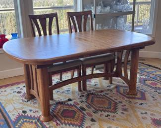 American made dining table w/hidden leaf and 8 matching chairs