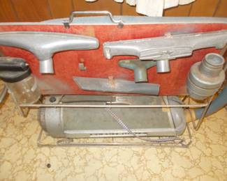 Electrolux with onboard attachment caddy