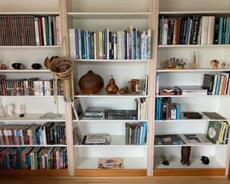 Pueblo pottery, Apache burden basket, and lots of books - vintage children's, art, ethnographic, mystery and fiction