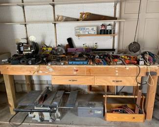 A workbench full of tools