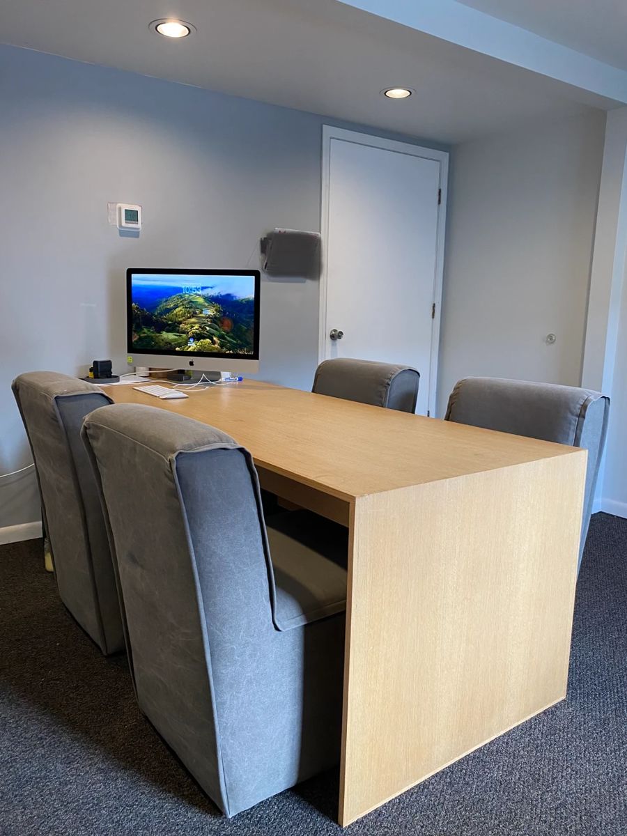 conference table / desk with fabric rolling chairs (will sell chairs separate from table)