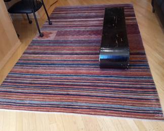 Red striped handwoven Kilim Rug signature waved into design, 106“ x 66” cut pile
$1000 Aprox 20 lbs