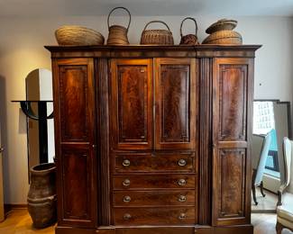Antique Comode Wardrobe George III 1800’
Molding cornice, 4 paneled side doors, 2 paneled central doors, 4 drawers.
89”h x 84”h x 22”d
Large Georgian English Mahogany Linen Cupboard
$10000