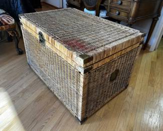 Vintage Wicker Chinoiserie Storage Chest 
A beautiful mid-20th century handwoven wicker storage chest with engraved Asian-inspired chinoiserie brass hardware
35”w x 24”d x 23”h
$600