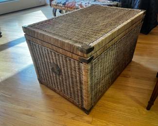 Vintage Wicker Chinoiserie Storage Chest 
A beautiful mid-20th century handwoven wicker storage chest with engraved Asian-inspired chinoiserie brass hardware
35”w x 24”d x 23”h
$600