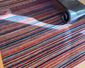 Red striped handwoven Kilim Rug signature waved into design, 106“ x 66” cut pile
$1000 Aprox 20 lbs