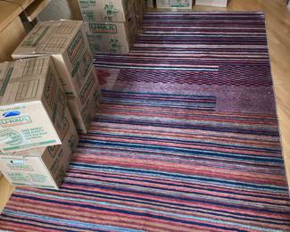 Red striped handwoven Kilim Rug signature waved into design, 106“ x 66” cut pile
$1000 Aprox 20 lbs