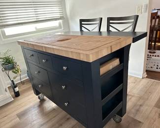 black kitchen island on wheels with butcher block top