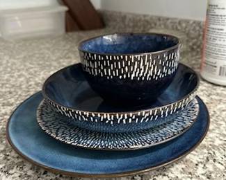 full set of blue ceramic dishware