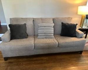 Grey living room couch and chair set
