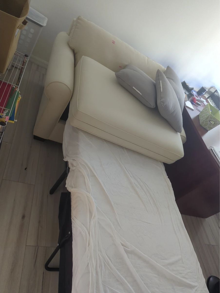 Pottery barn chair with pull out memory foam twin bed. $1800 new. $500 on sunday