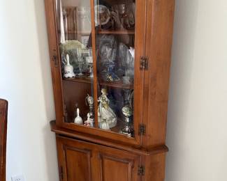 Rusticated tall cabinet