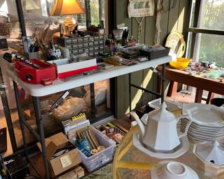 Independence dishes, vintage patio table and chairs, lots of tools