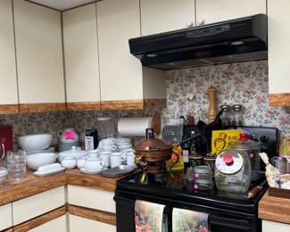 Kitchen, Dansk dishes, utensils, small appliances, cabinets are full.